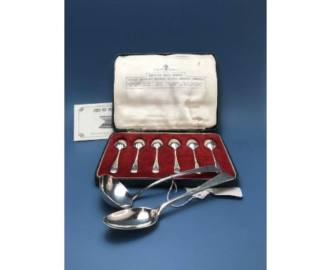 An Old English pattern silver sauce ladle and a dessert spoon by Hampston, Prince and Cattle, York 1799 and 1801 together wit