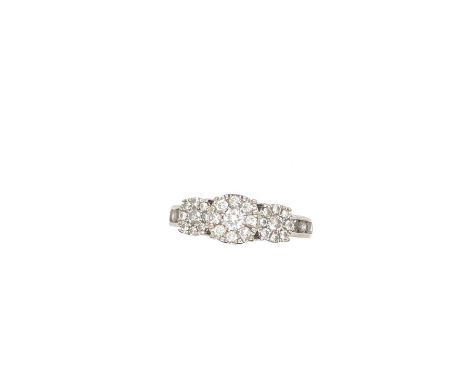 A 9ct white gold hallmarked triple cluster diamond ring, approximate diamond weight as stated 1.00ct. Finger size R. Weight 3