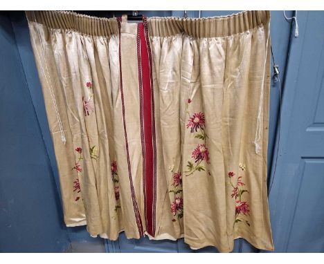 Two pairs of Chinese red silk lined curtains, together with three pairs of floral embroidered silk curtains of varying size a