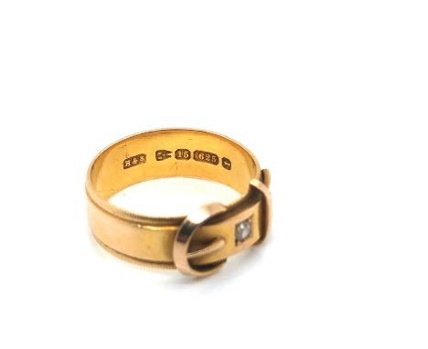 An antique Victorian 15ct gold and two-stone diamond set buckle ring. Hallmarked Chester 1882, for Henry Hyde &amp; Sons. Fin