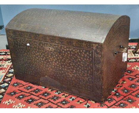 A 19th Century painted Eastern trunk, with domed lid and swan-neck handles to each side, decorated over all with scrolling vi