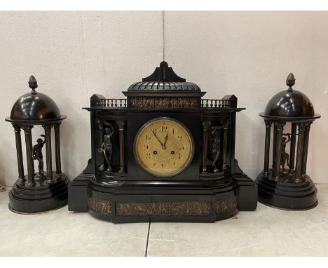 A LARGE DECORATIVE POLISHED SLATE OVER MANTEL CLOCK WITH EMBOSSED COPPER DEPICTING ROMAN SCENES 50CM WIDTH 38CM HEIGHT WITH T