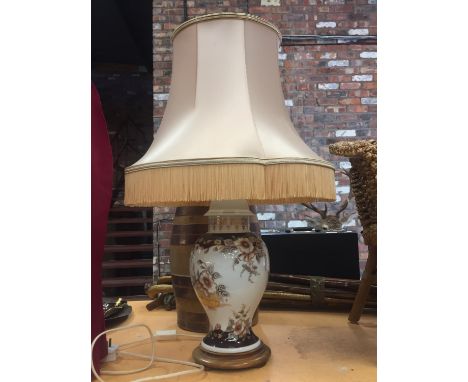 A TALL CERANIC LAMP BASE WITH SHADE 