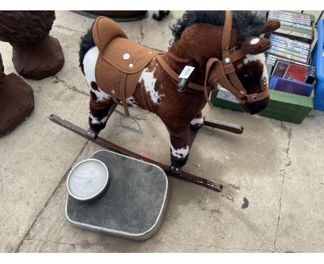 A CHILDS ROCKING HORSE AND A SET OF BATHROOM SCALES 