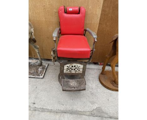 A VINTAGE RECLINING DENTIST CHAIR 
