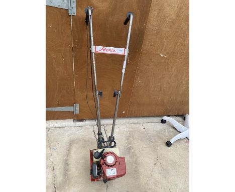 A MANTIS PETROL ENGINE GARDEN ROTAVATOR BELIEVED IN WORKING ORDER BUT NO WARRANTY 