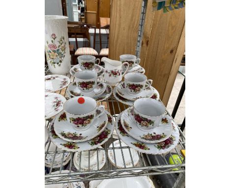 A LARGE COLLECTION OF CERAMIC WARE TO INCLUDE ROYASL NORFOLK TRIOS, COMEMERATIVE PLATES AND COLCLOUGH TRIOS ETC 