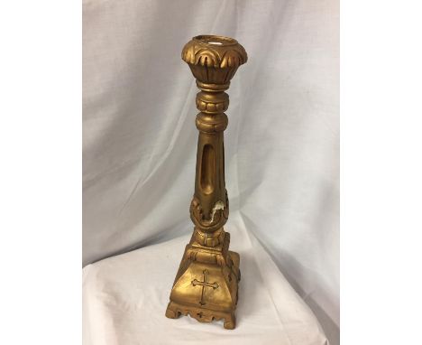 A WOODEN ECCLESIASTICAL CANDLESTICK MEASURING 59CM HIGH 