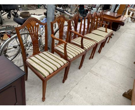 A YEW WOOD TWIN PEDESTAL DINING TABLE WITH EXTRA LEAF, SIX CHAIRS, TWO BEING CARVER 