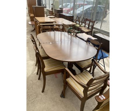 A REGENCY TWIN PEDESTAL DINING TABLE AND SIX CHAIRS 