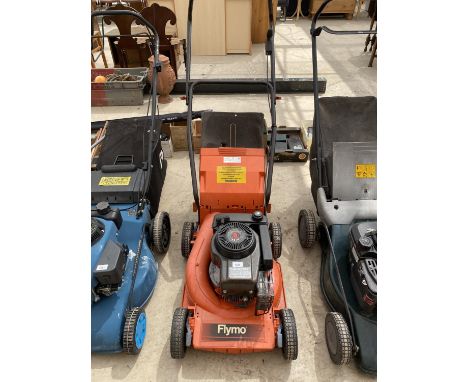 A FLYMO LAWNCHIEF RL400 WHEELED ROTARY PETROL LAWN MOWER WITH GRASS BOX BELIEVED WORKING ORDER BUT NO WARRANTY 