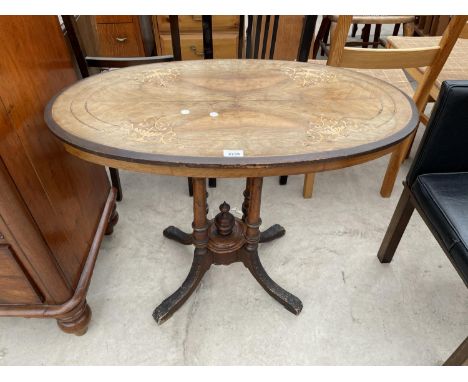 AN OVAL VICTORIAN LOO TABLE 