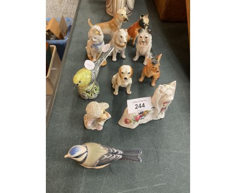 A SELECTION OF CERAMIC BIRDS AND DOGS 