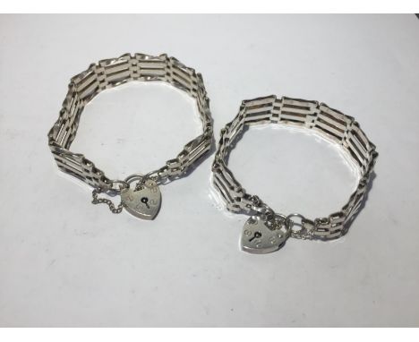 TWO SILVER GATE BRACELETS 
