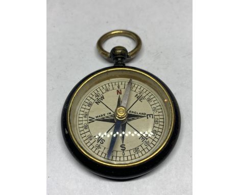 A MILITARY COMPASS 