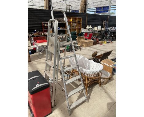A 5 RUNG ALLUMINIUM STEP LADDER AND A FURTHER 4 RUNG ALLUMINIUM STEP LADDER 