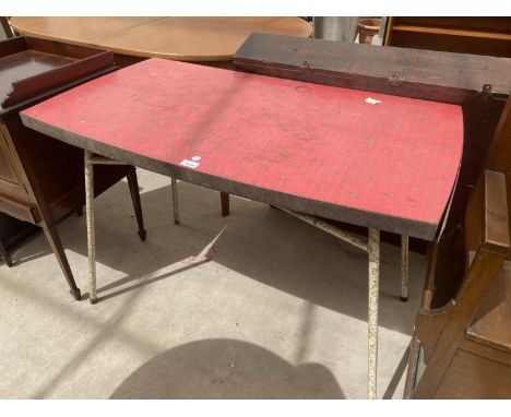 A 1950'S KITCHEN TABLE ON TUBULAR BASE 