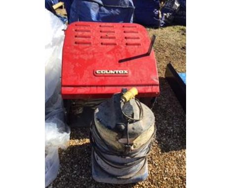 A 110V INDUSTRIAL VACUUM AND COUNTAX GARDEN TRACTOR PARTSNB:THESE ITEMS ARE TO BE COLLECTED FROM HEATHER BANK FARM, CONGLETON