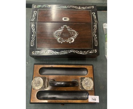 AN INLAID MOTHER OF PEARL WRITING SLOPE WITH KEY AND A FURTHER INK WELL SET 