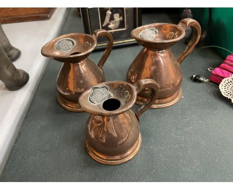 THREE MARKED VINTAGE COPPER MEASURING JUGS 