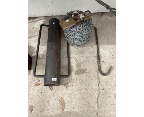A ROLL OF BARBWIRE, A CROWBAR AND A POST KNOCKER 