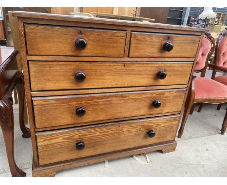 A VICTORIAN PITCH PINE CHEST OF TWO SHORT AND THREE LONG DRAWERS, ON BRACKET FEET, 45" WIDE 