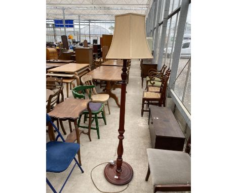 A MODERN STANDARD LAMP WITH TURNED AND FLUTED COLUMN COMPLETE WITH SHADE 