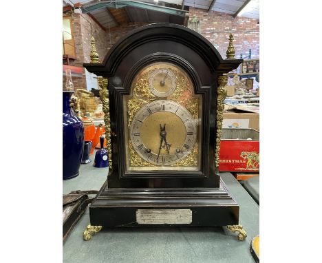 A VICTORIAN EBONISED BRACKET CLOCK WITH SILVERISED DIAL, GILDED DECORATION AND PIERCED SIDE PANELS, HOUR AND QUARTER CHIMING 
