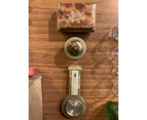 THREE ONYX PIECES TO INCLUDE A LIDDED CIGARETTE BOX WITH CLAW FEET, A CIGARETTE LIGHTER AND A WEATHER BAROMETER 