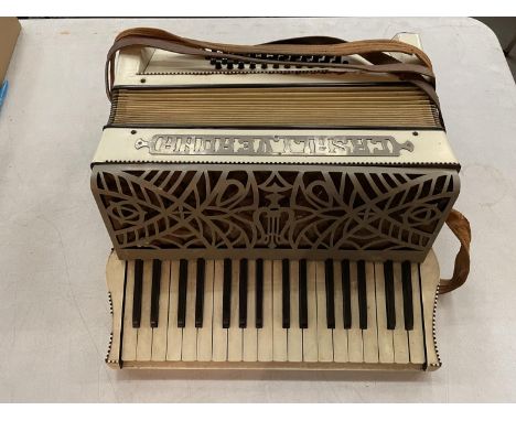 A VINTAGE ACCORDIAN 
