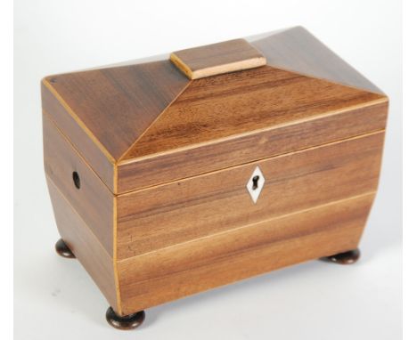LATE GEORGIAN LINE INLAID ROSEWOOD TEA CADDY, of sarcophagus form with lozenge shaped bone escutcheon and bun feet, lacks sid