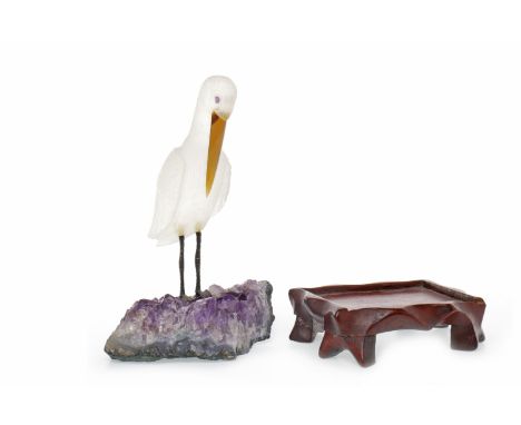 20TH CENTURY CHINESE OPAQUE GLASS MODEL OF A CRANEon a naturalistically formed amethyst base, 14cm high 