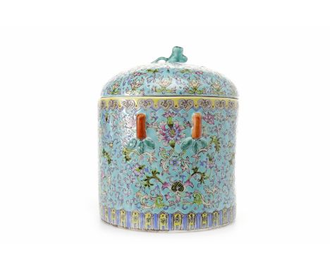 MID 20TH CENTURY CHINESE POLYCHROME ENAMEL LIDDED JAR decorated overall with florals on a turquoise ground, mark to base, 22c