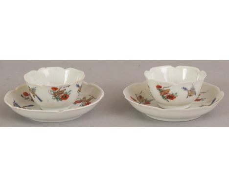 A PAIR OF GOOD QUALITY 18TH CENTURY CHINESE FAMILLE ROSE PORCELAIN TEABOWLS & SAUCERS, each petal-lobed piece unusually paint