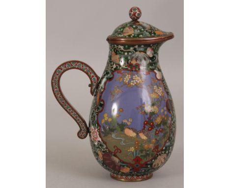 A FINE QUALITY JAPANESE MEIJI PERIOD CLOISONNE JUG & HINGED COVER, some of the cloisons in silver-wire, the pear-form body de