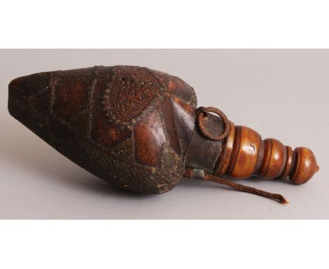 AN UNUSUAL PERSIAN QAJAR WOOD & HORN FLASK, the heart-form body overlaid with pierced metal borders and fittings and carved w