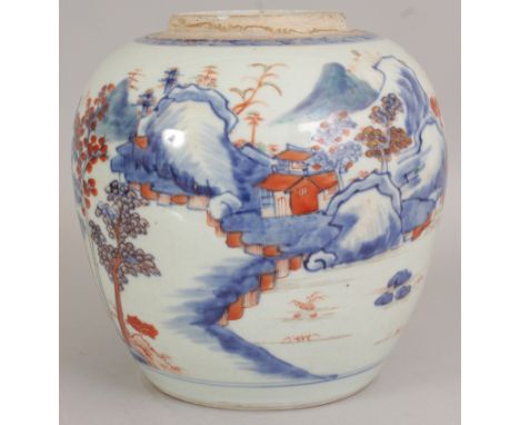 AN EARLY 18TH CENTURY CHINESE KANGXI PERIOD CHINESE IMARI PORCELAIN JAR, the sides of the ovoid body painted with a continuou