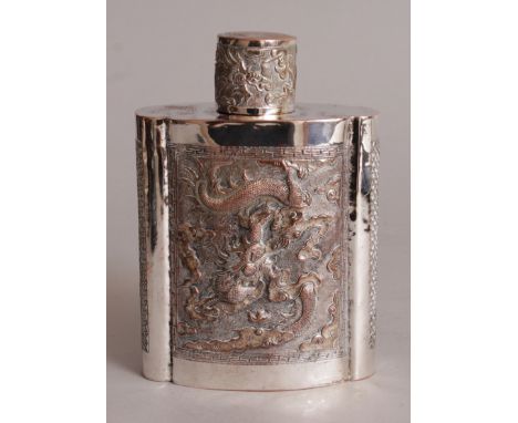 A GOOD QUALITY 19TH/20TH CENTURY CHINESE SILVERED COPPER TEA CADDY & COVER, of near quatrefoil section, the sides embossed wi