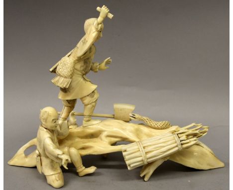 A JAPANESE MEIJI PERIOD SECTIONAL IVORY OKIMONO, in the form of two woodcutters on a curved trunk defending themselves from a