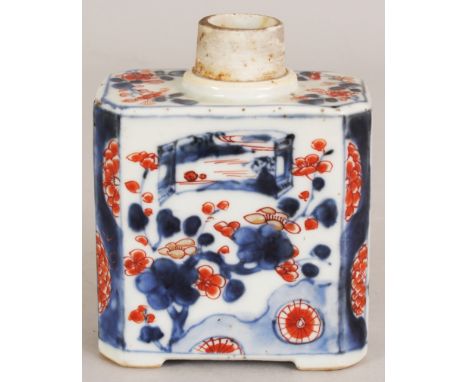 A CHINESE IMARI KANGXI PERIOD PORCELAIN TEA CADDY, of chamfered rectangular form, the sides painted with two panels of a scro