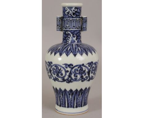 A CHINESE MING STYLE BLUE & WHITE PORCELAIN ARROW VASE, the sides decorated with formal foliate borders and designs, the neck