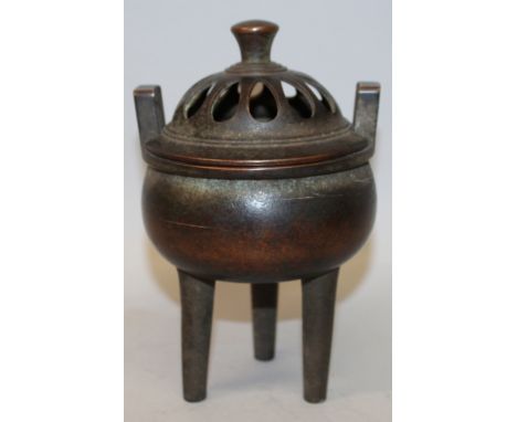 A CHINESE BRONZE TRIPOD CENSER & COVER, weighing 1.95Kg, each piece with pronounced patination, the base with a six-character
