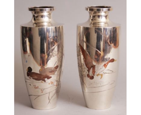 A GOOD PAIR OF EARLY 20TH CENTURY JAPANESE SILVER VASES, with some mixed metal inlay, weighing 1.27Kg in total, each with eng