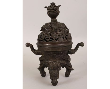 A GOOD 18TH CENTURY CHINESE QIANLONG PERIOD BRONZE ELEPHANT TRIPOD CENSER & COVER, weighing 1.7Kg, with good patination, the 