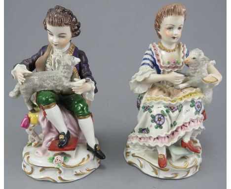 A pair of early twentieth century Sitzendorf shepherd and shepherdess figures, c. 1920. They are well modelled and sit upon r