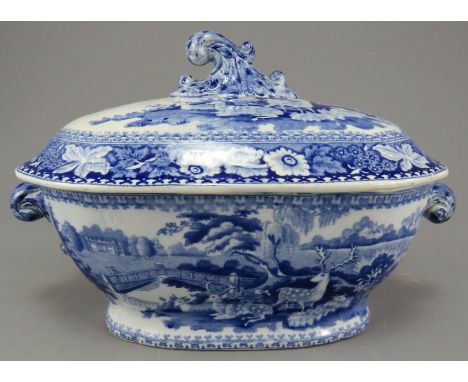 An early nineteenth century blue and white transfer-printed Ridgway Osterley Park pattern sauce tureen, c. 1825. It is unmark