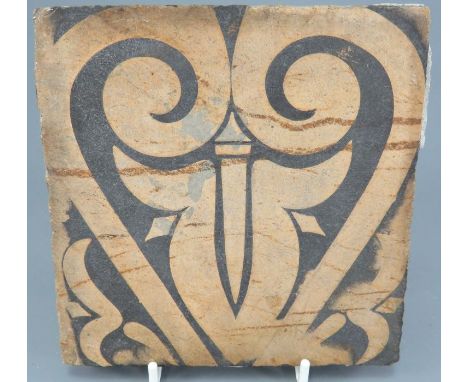 A late nineteenth century Poole Pottery encaustic-style tile, c. 1880. It was made by Jesse Carter and has a black-printed de