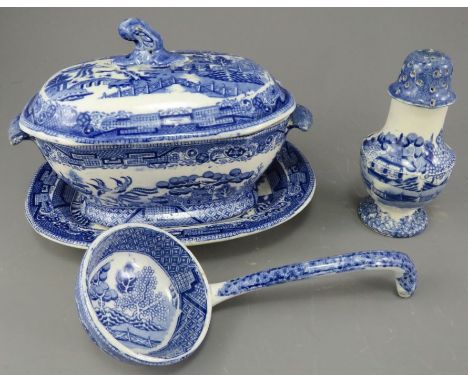 A group of early nineteenth century blue and white transfer-printed Willow wares, c. 1820-40. To include a pepper pot and a s