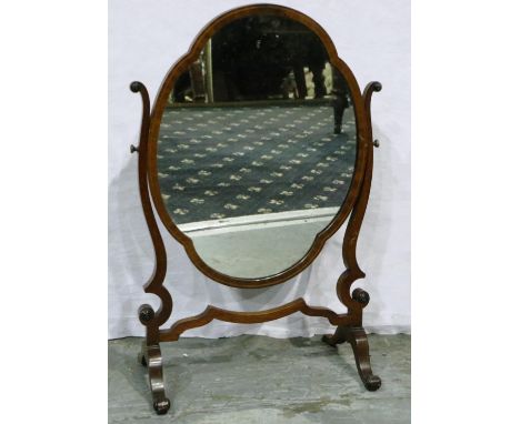 A Georgian walnut framed oval toilet mirror, H: 70 cm. Not available for in-house P&amp;P 
