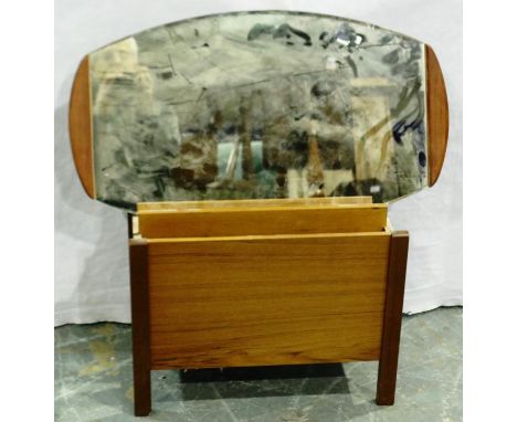 Rex furniture, a mid 20th century teak magazine rack, 46 x 20 x 34 cm H, with its retailers tag attached, and a mirror, unnam